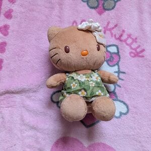 Hello Kitty tan hawaii plushie with flower dress